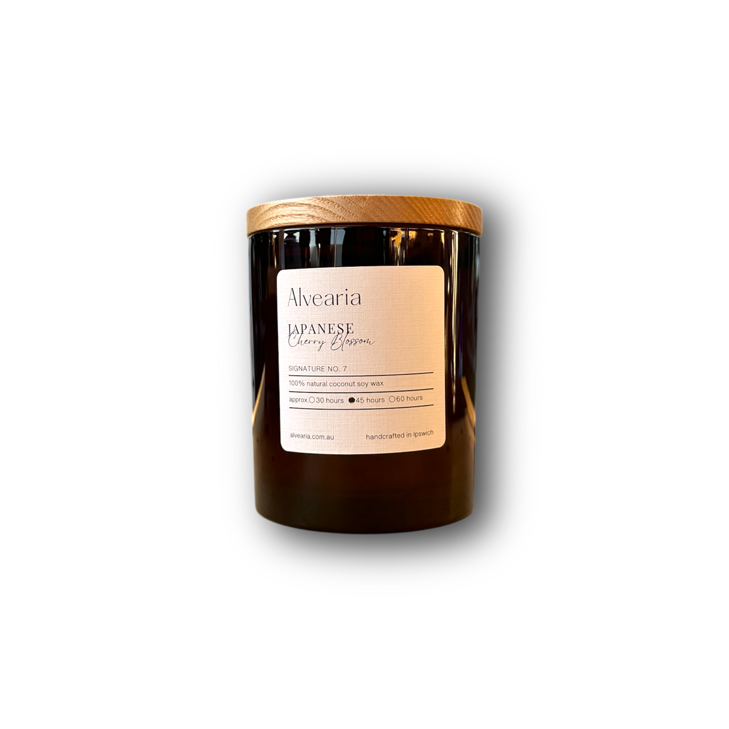 hand-poured soy candle in amber glass jar