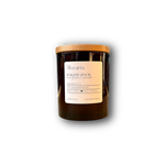 hand-poured soy candle in amber glass jar