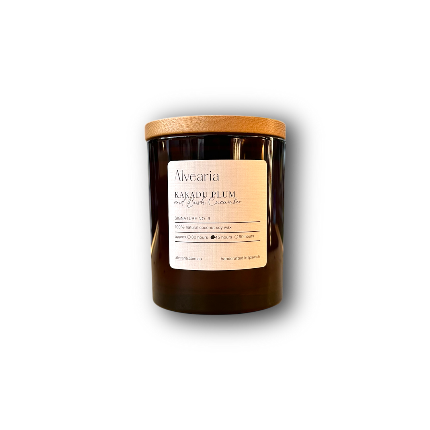 hand-poured soy candle in amber glass jar
