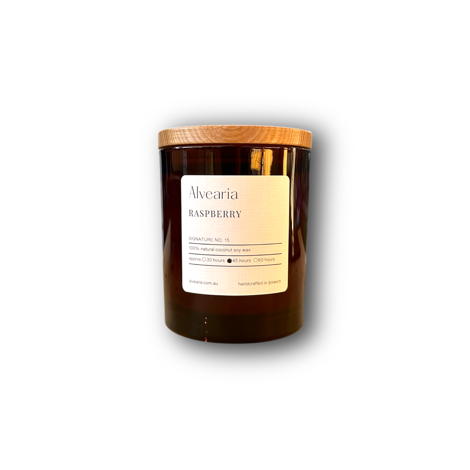 hand-poured soy candle in amber glass jar
