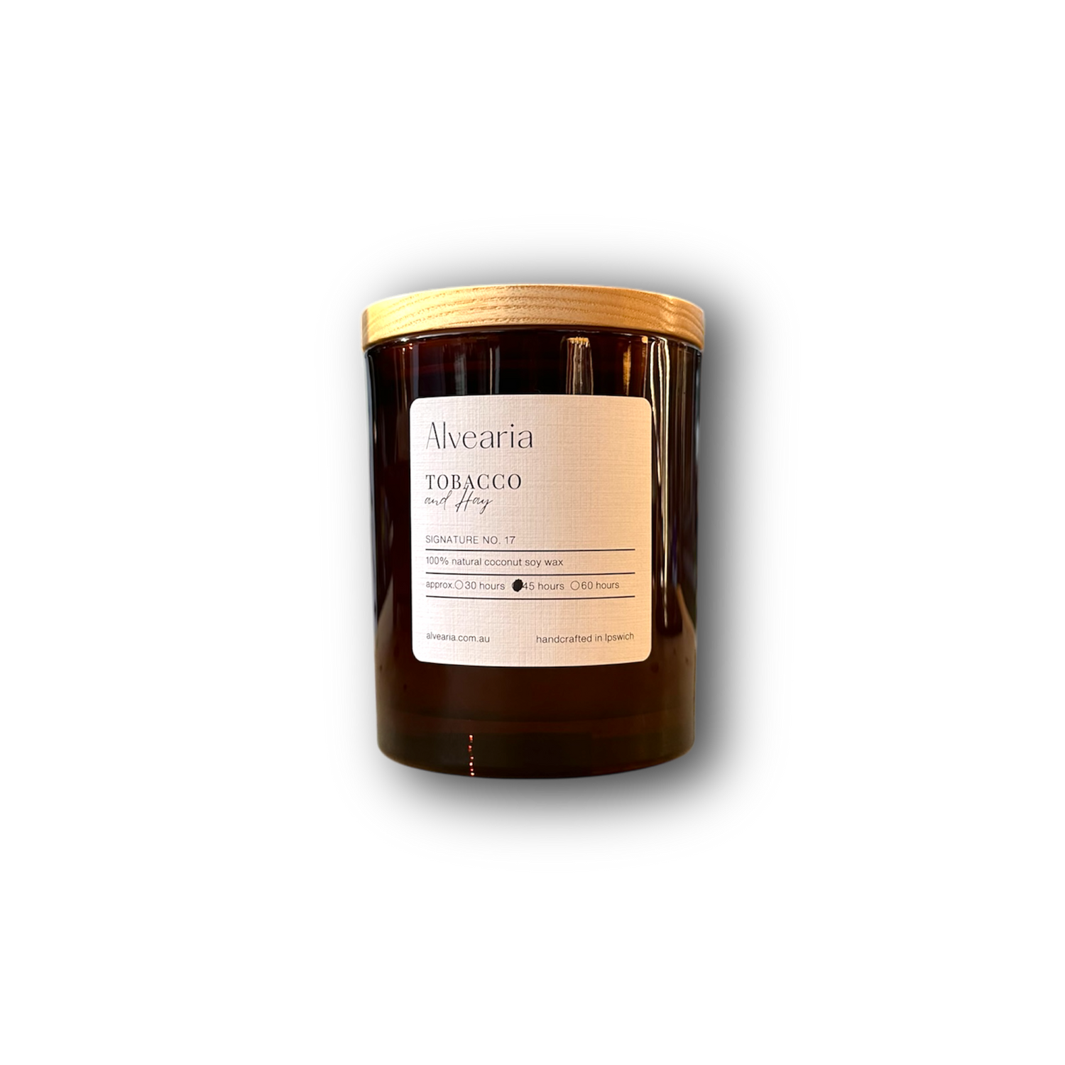 hand-poured soy candle in amber glass jar