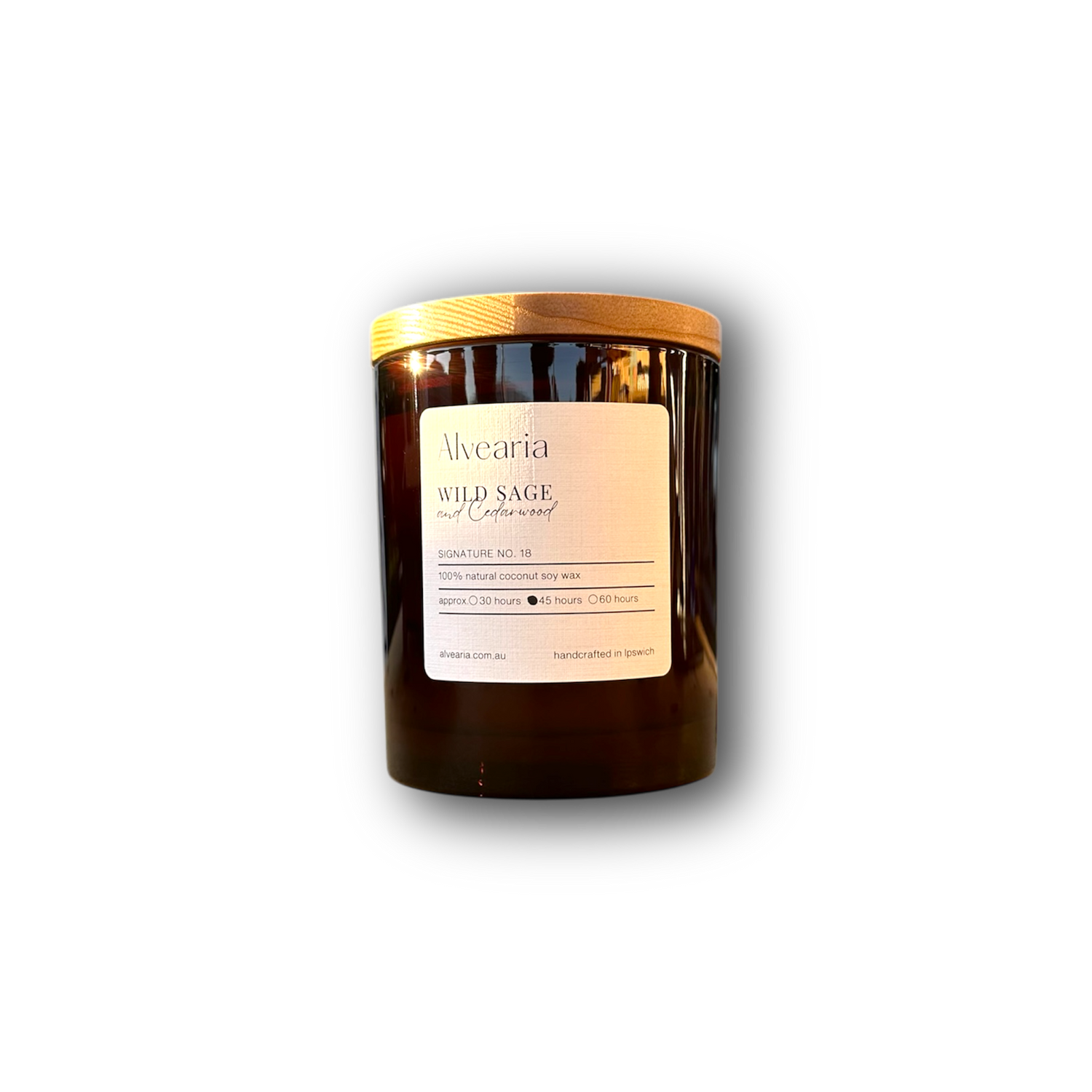 hand-poured soy candle in amber glass jar